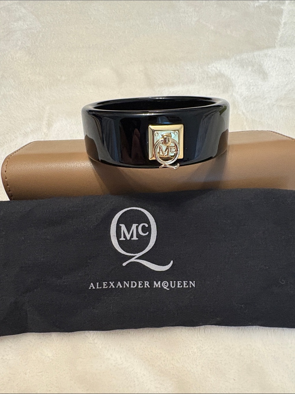 Alexander McQueen Black Bangle with Gold Logo Charm